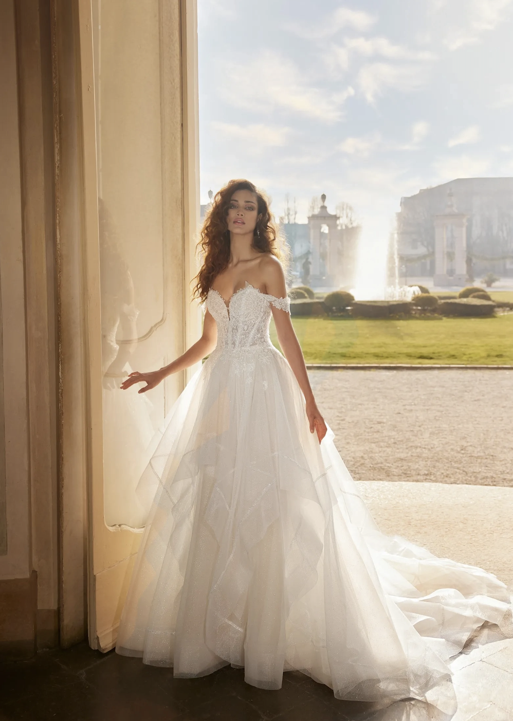 Model wearing Dolly wedding dress by Randy Fenoli