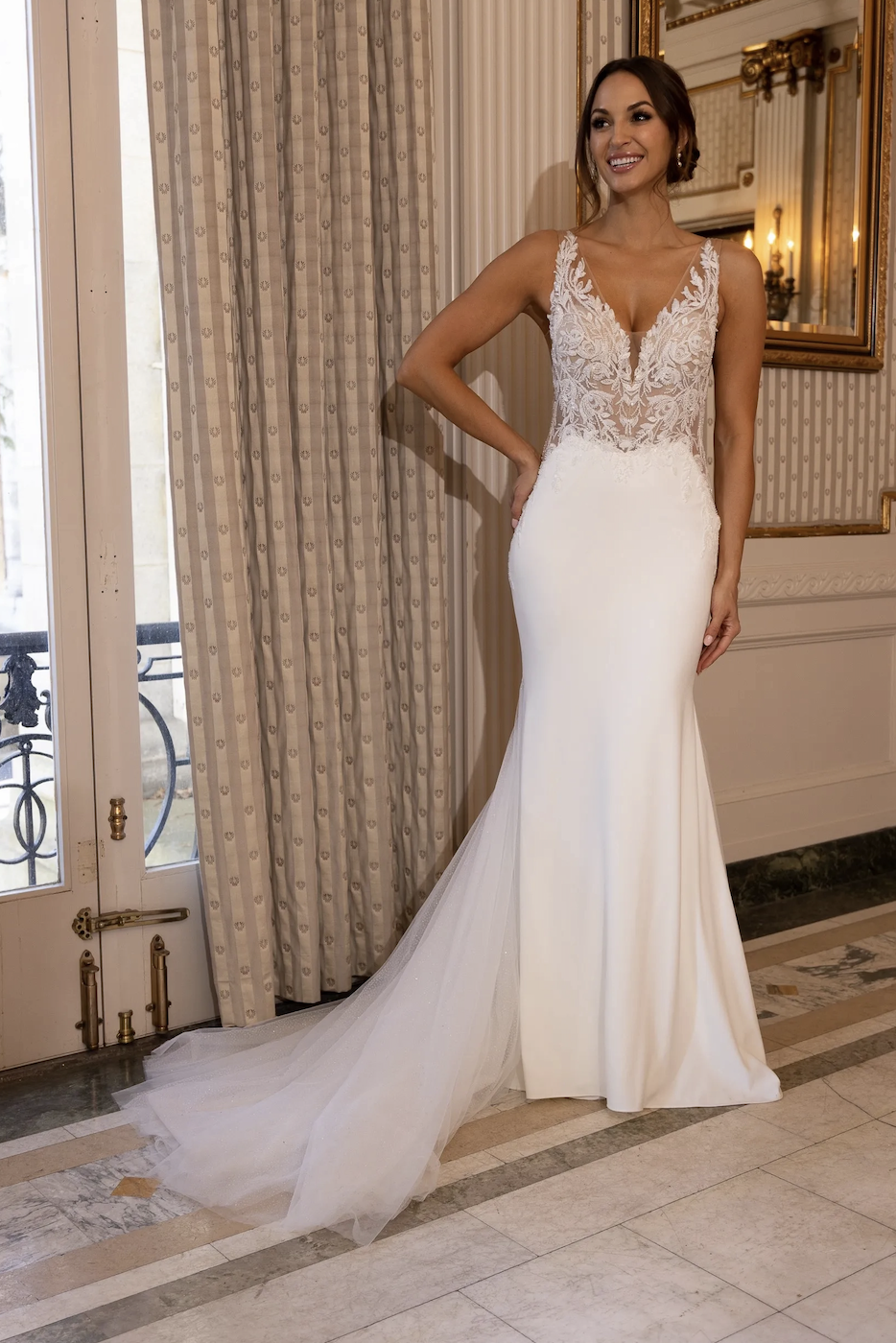 Model wearing Emery wedding dress by Randy Fenoli