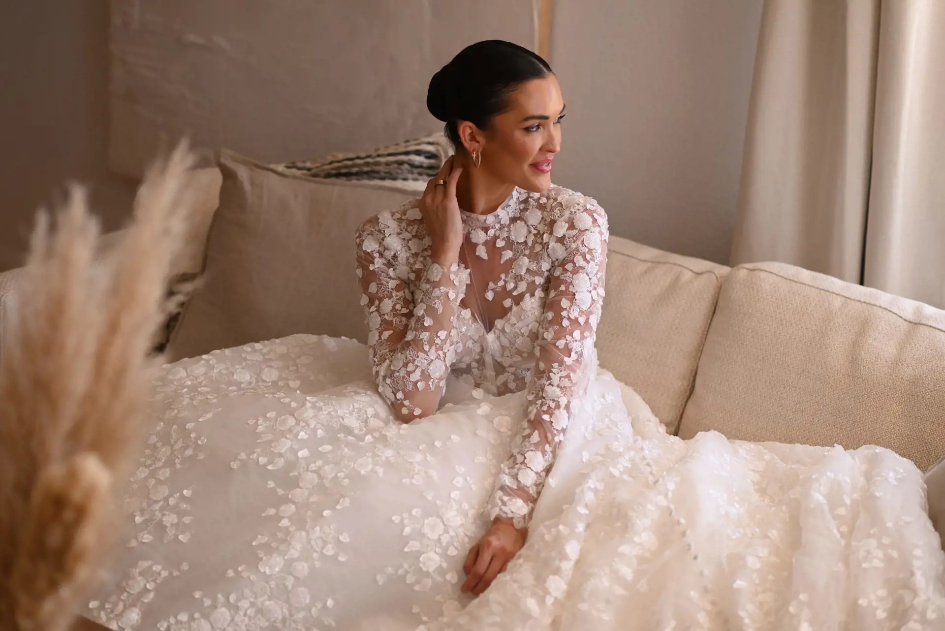 Model wearing a white bridal gown