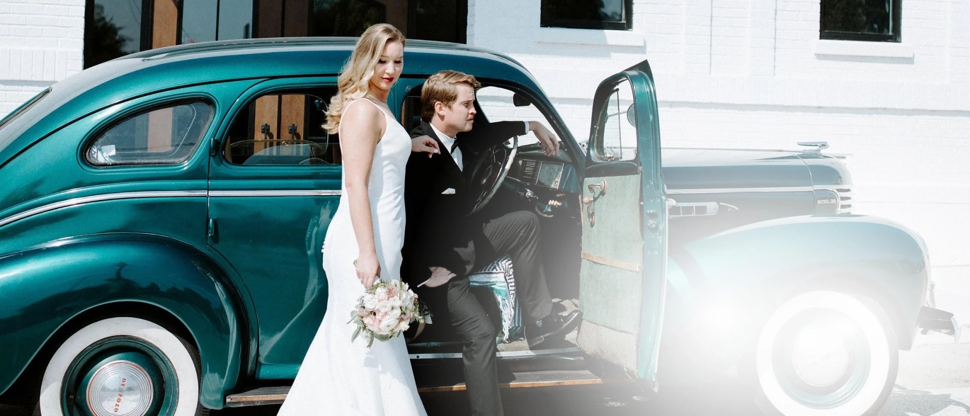 Photo of a male model wearing a gray tuxedo