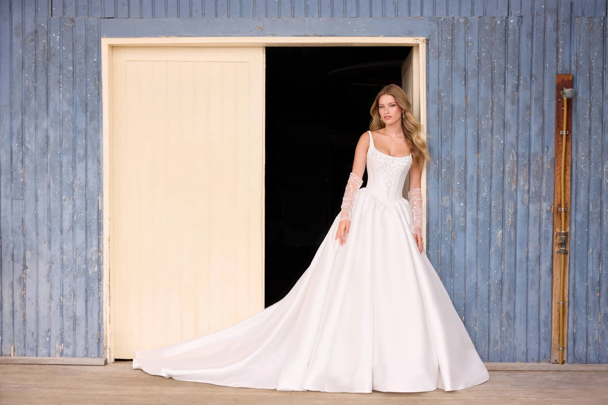 Model wearing a white bridal gown