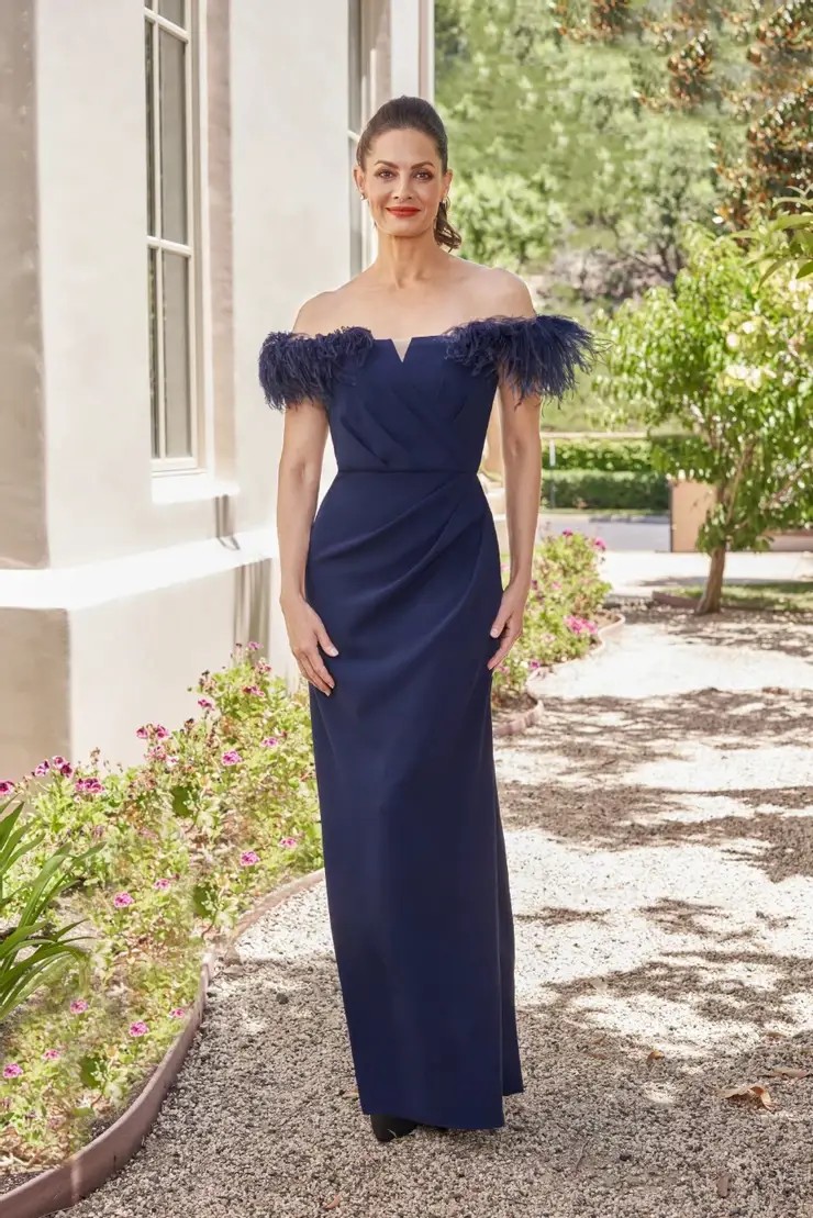Model wearing a mother of the wedding gown by Jade
