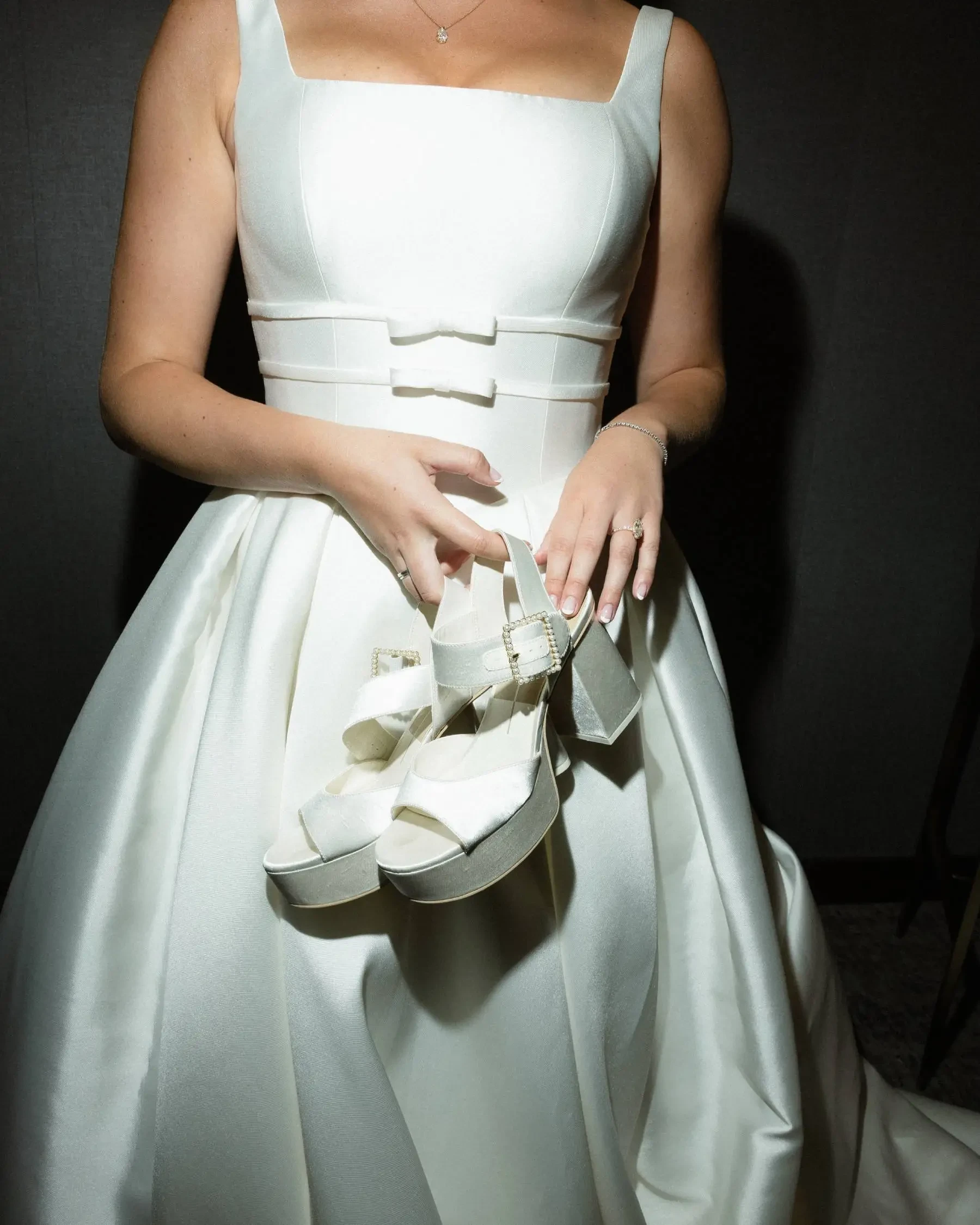 Close up of bow detailed wedding dress