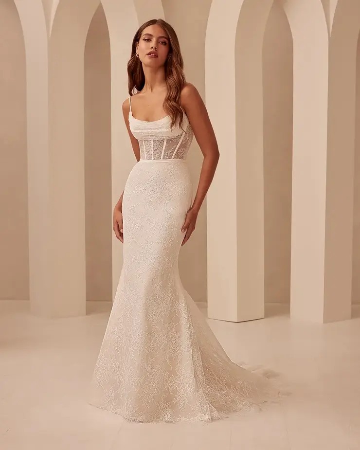 Model wearing Mikaella wedding dress