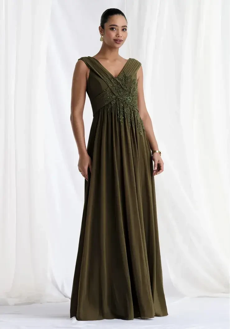 Model wearing a mother of the wedding gown by MGNY