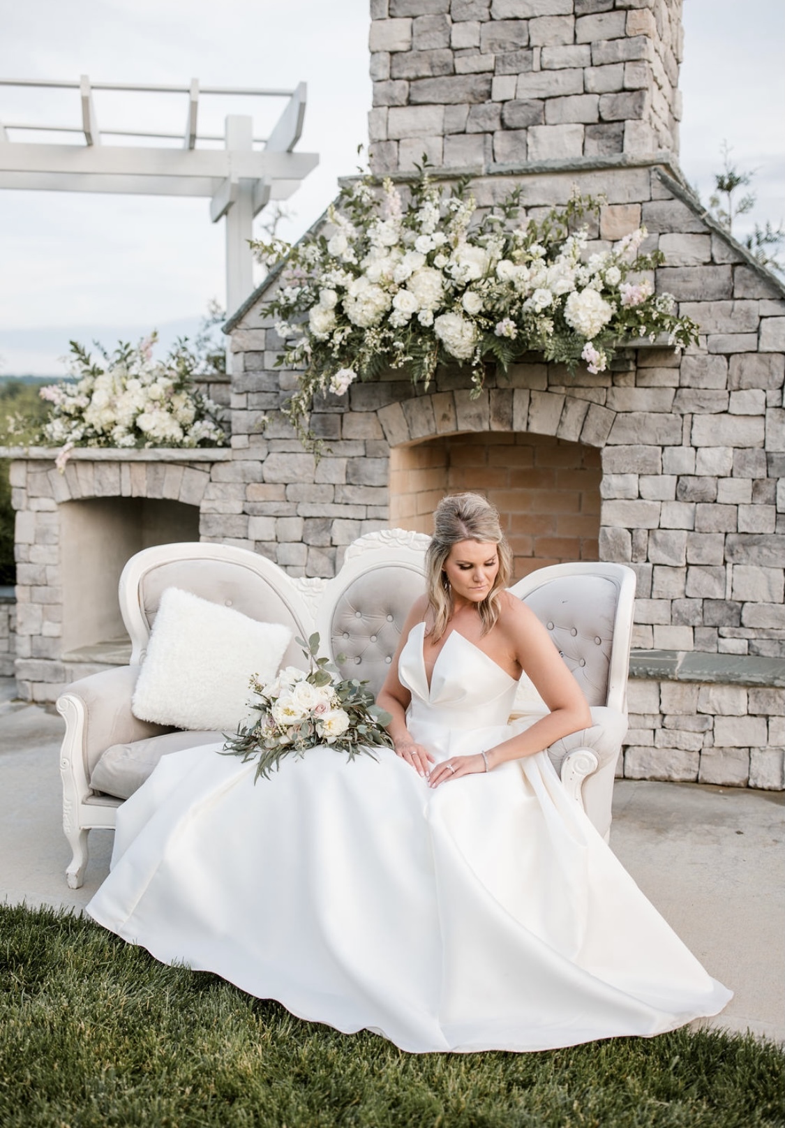 Model wearing a white gown